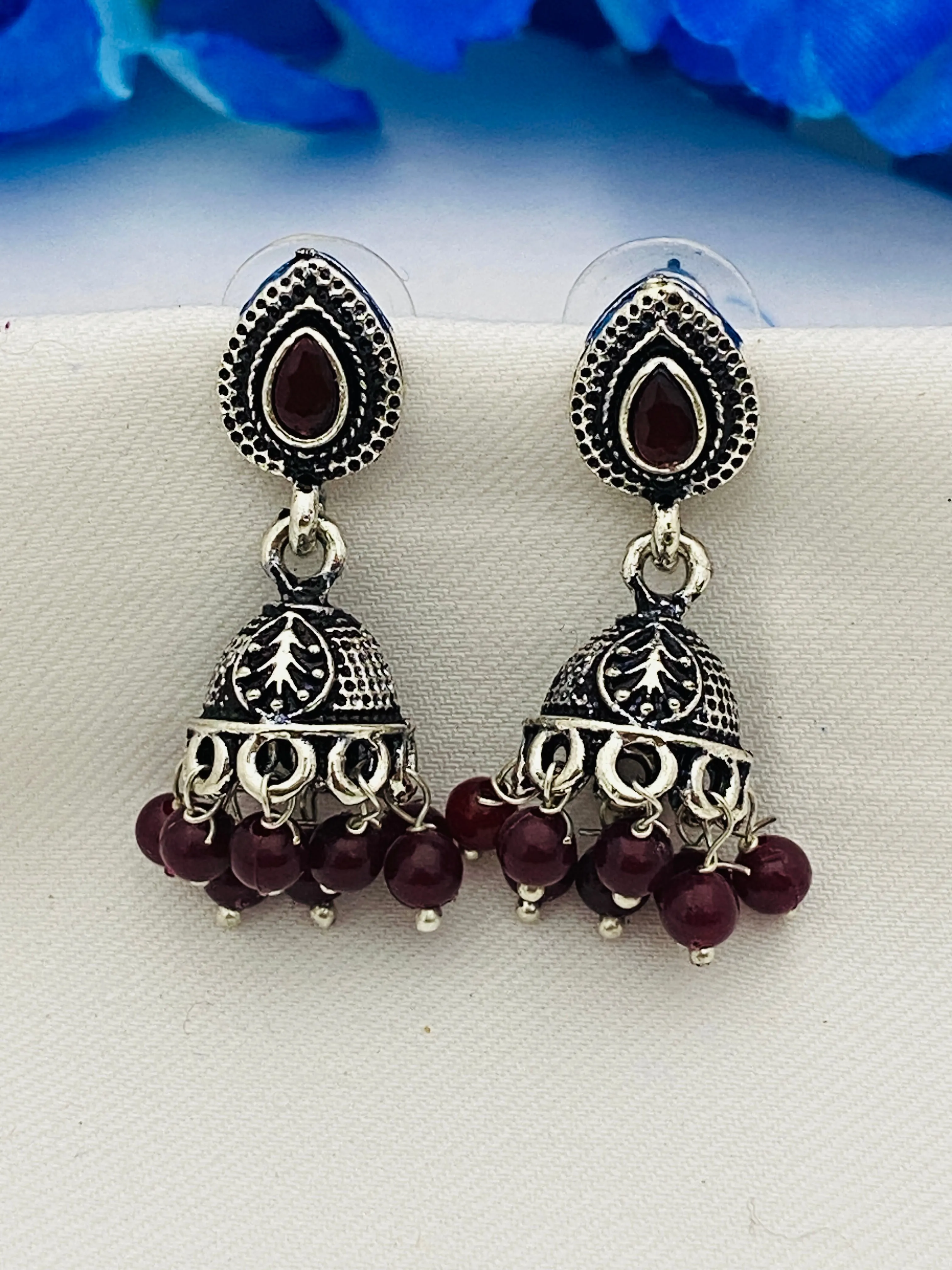 Beautiful Brown Color Crystal Ruby Silver Plated Oxidized Jhumka Earrings