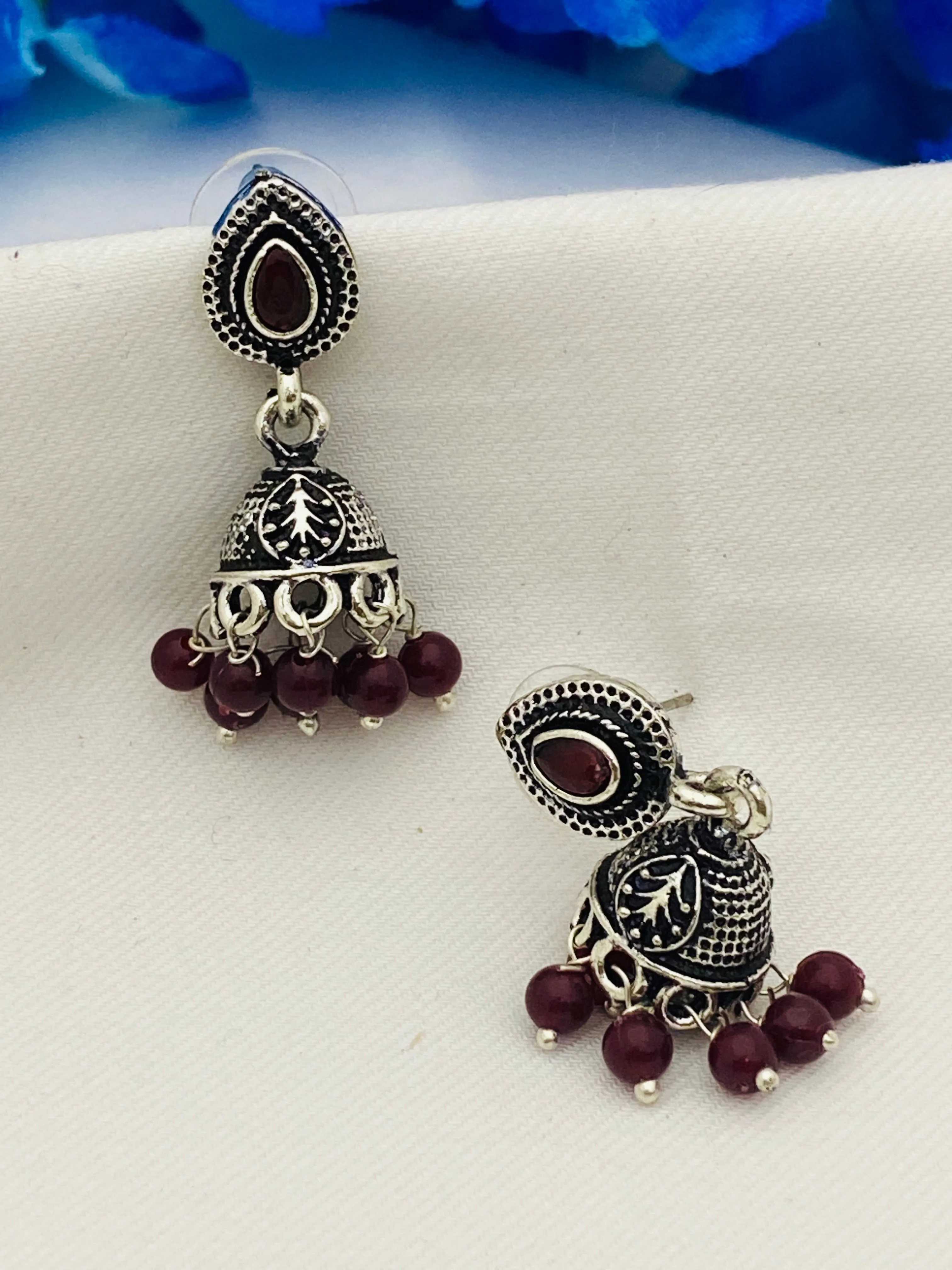 Beautiful Brown Color Crystal Ruby Silver Plated Oxidized Jhumka Earrings