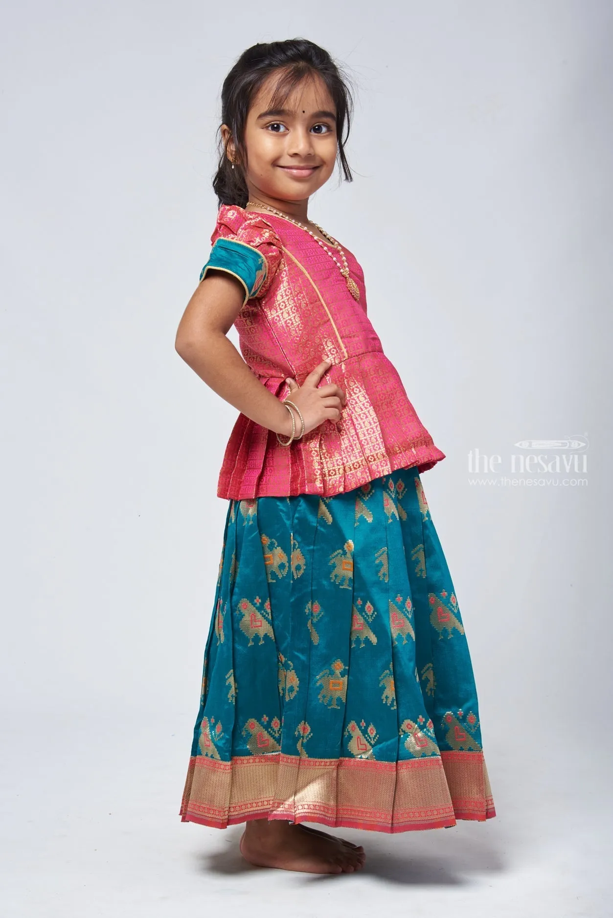 Classic Pattu Langa Silk Peplum Green Blouse with Traditional Pavadai Sattai - Festive Delight