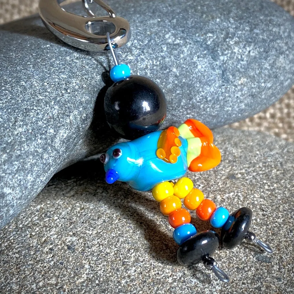 Colorful Shungite Bird Clip-on, Blue & Yellow, Artisan Lampwork Glass