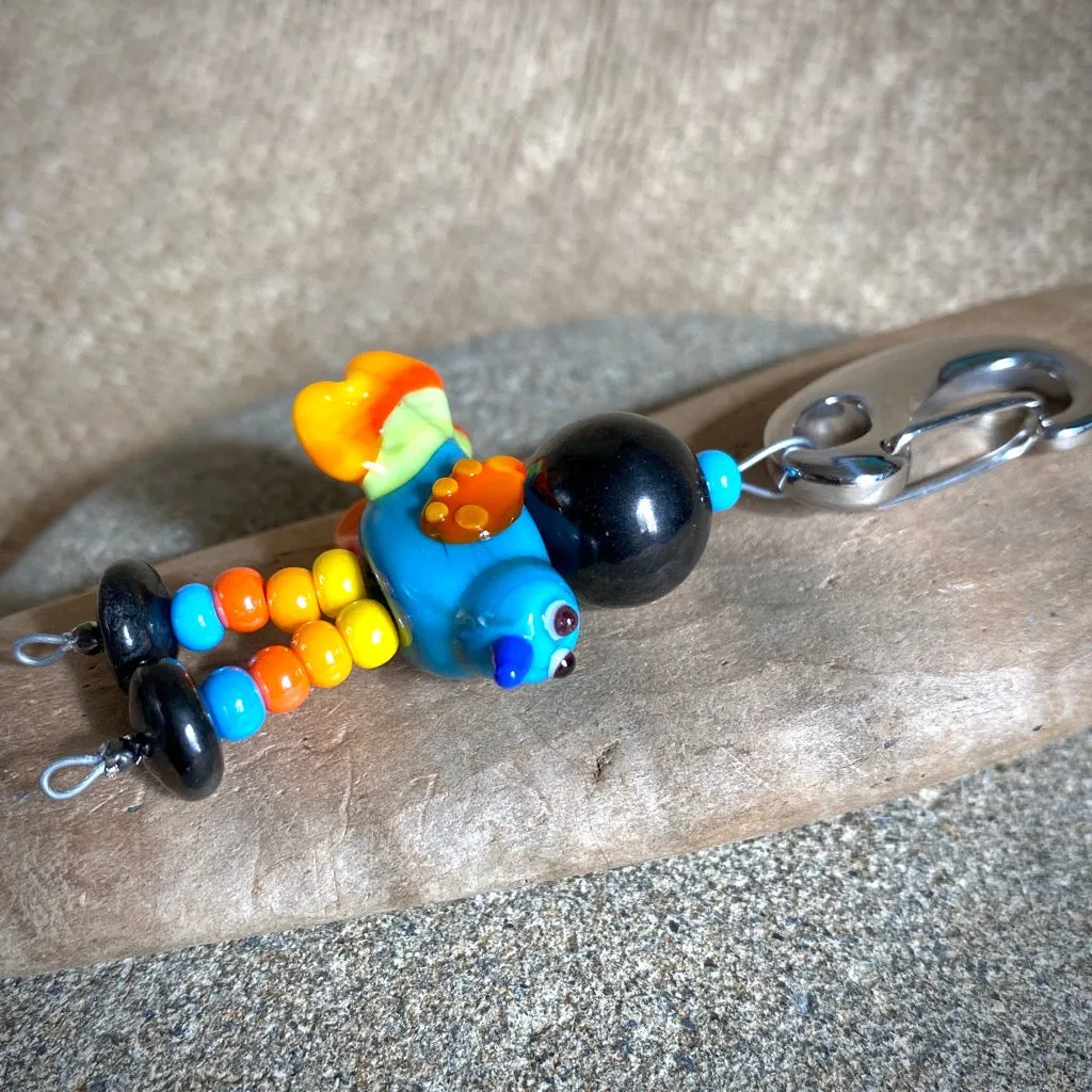 Colorful Shungite Bird Clip-on, Blue & Yellow, Artisan Lampwork Glass