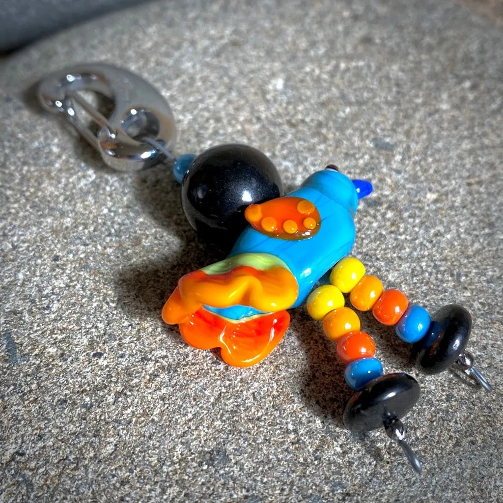 Colorful Shungite Bird Clip-on, Blue & Yellow, Artisan Lampwork Glass