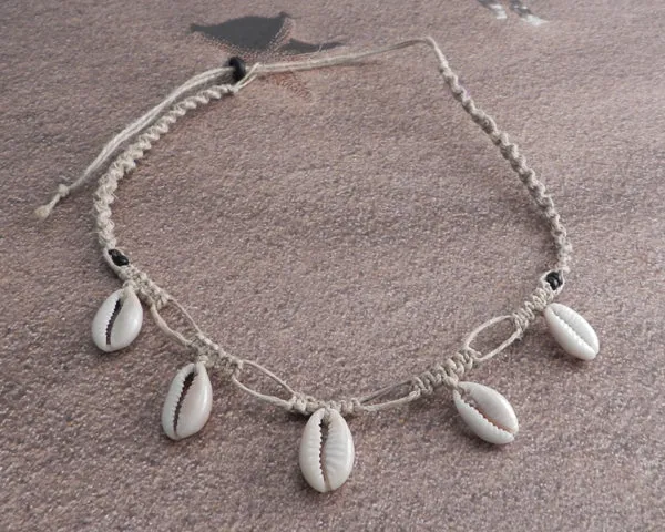 Cowry Dangle with Black seed beads.