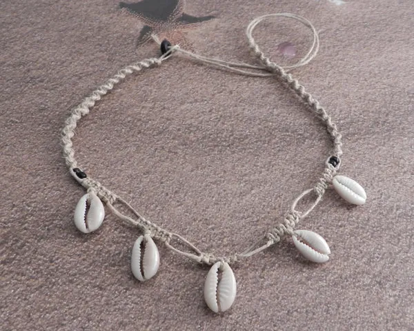 Cowry Dangle with Black seed beads.